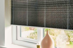 Pleated blinds in modern bedroom.