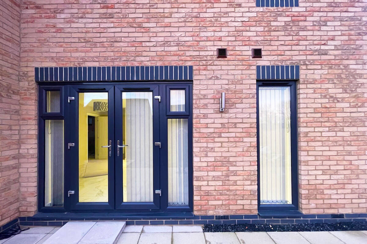 Vertical blinds in doors and window of modern house.