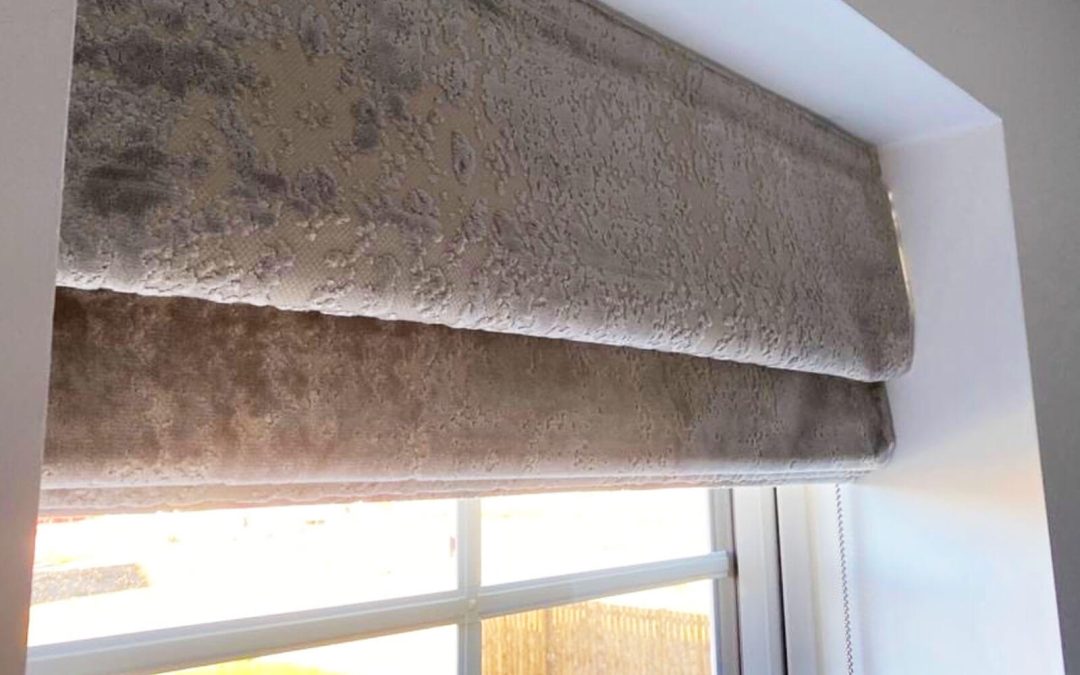Close up of roman blind in small lounge window. Pleated Blinds