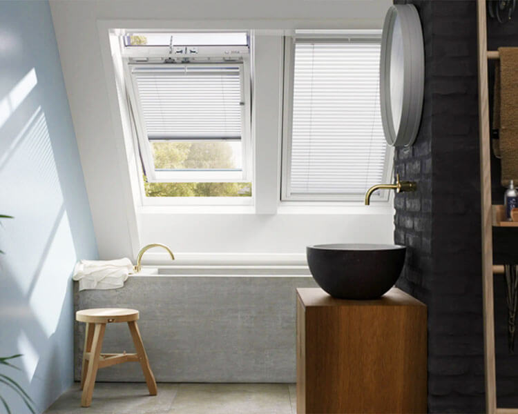 Skylight blinds in modern bathroom.