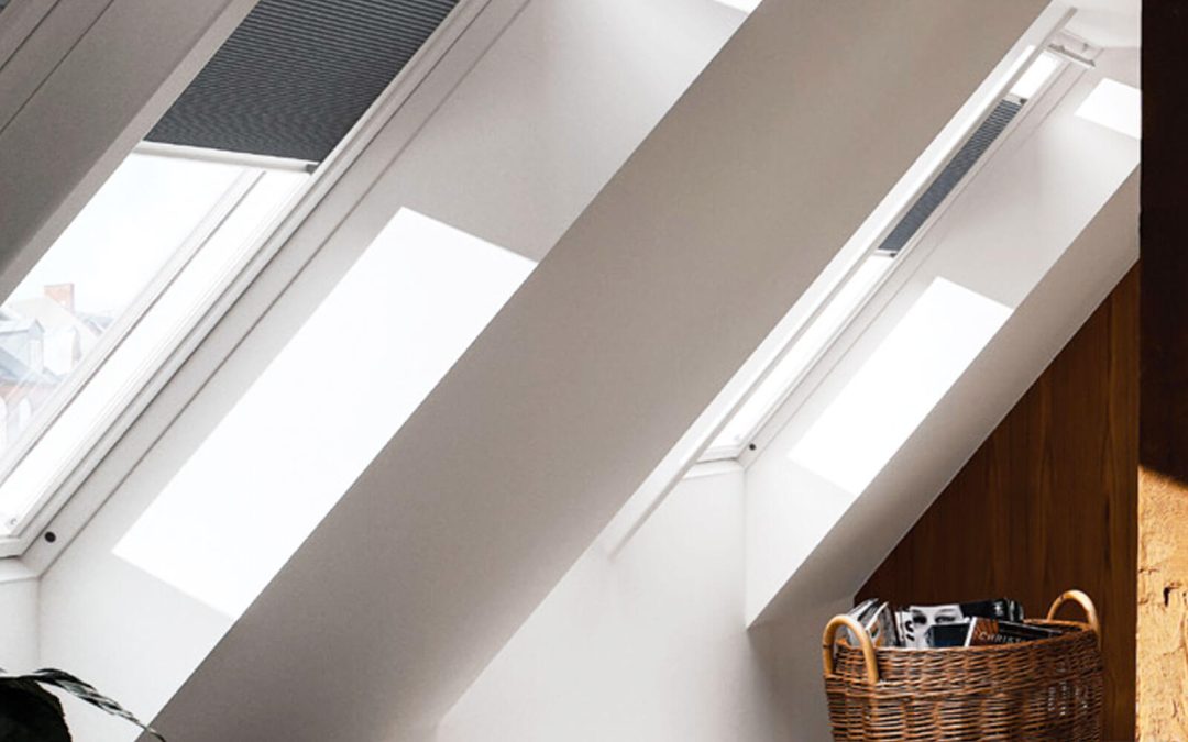 Skylight blinds in modern bedroom with wood decor, with blackout blind.